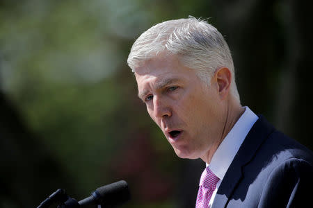 FILE PHOTO: Judge Neil Gorsuch speaks after his swearing as an associate justice of the Supreme Court in the Rose Garden of the White House in Washington, U.S., April 10, 2017. REUTERS/Carlos Barria/File Photo