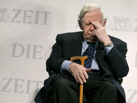 Former German Chancellor Helmut Schmidt attends a discussion during the 'German Economy Forum' organized by German weekly newspaper 'Die Zeit', at the St. Michaelis church, the so called 'Michel', in Hamburg in this December 10, 2010 file photo. REUTERS/Christian Charisius/Files