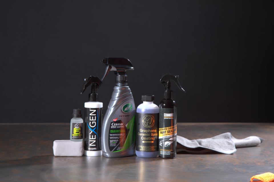 a line up of different ceramic coatings on a grey table