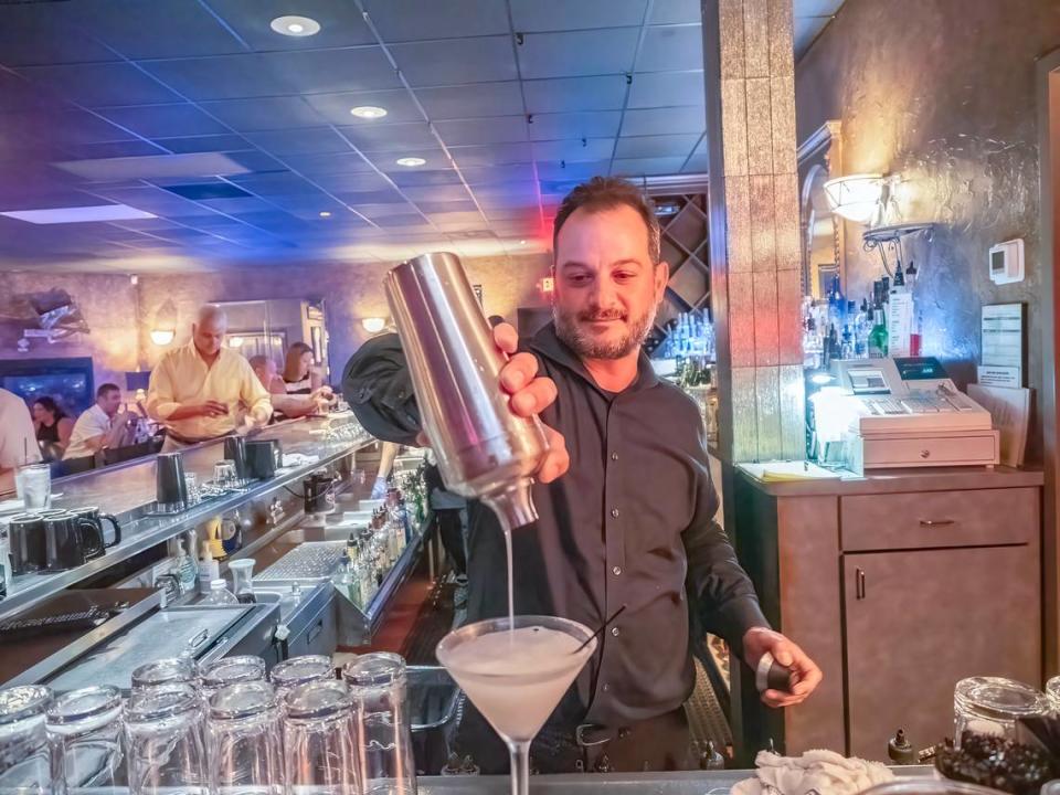 Bartender Sam Zicarelli, master mixologist, works his magic at Touche.