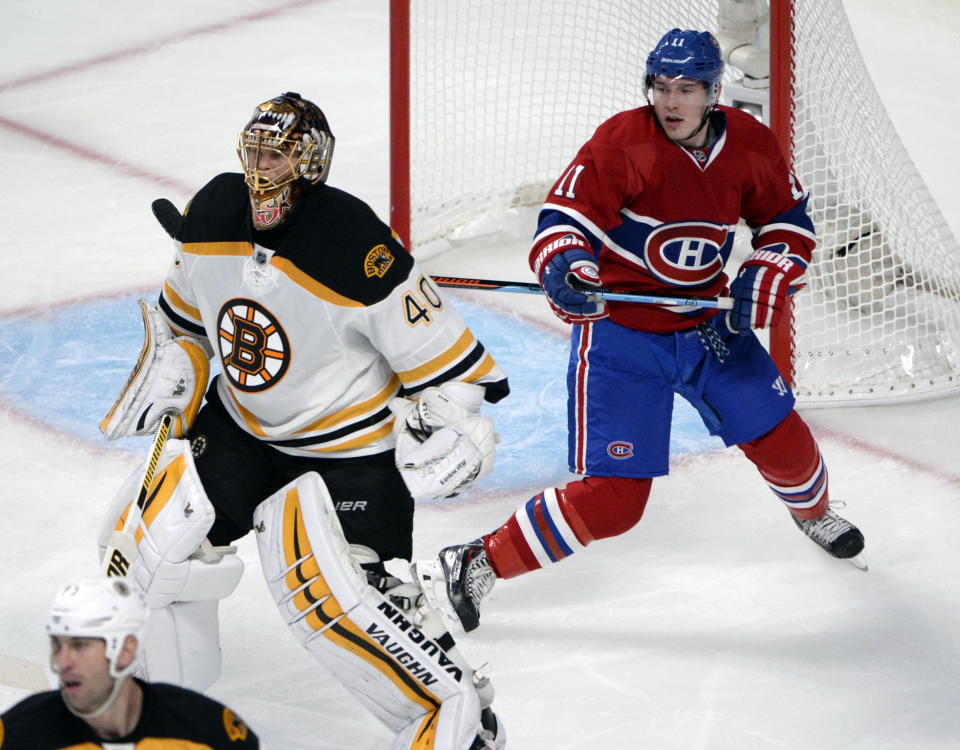 Oct 16, 2014; Montreal, Quebec, CAN; Montreal Canadiens forward Brendan Gallagher (11) behind Boston Bruins goaltender Tuukka Rask (40) during the second period at the Bell Centre. (Eric Bolte-USA TODAY Sports)