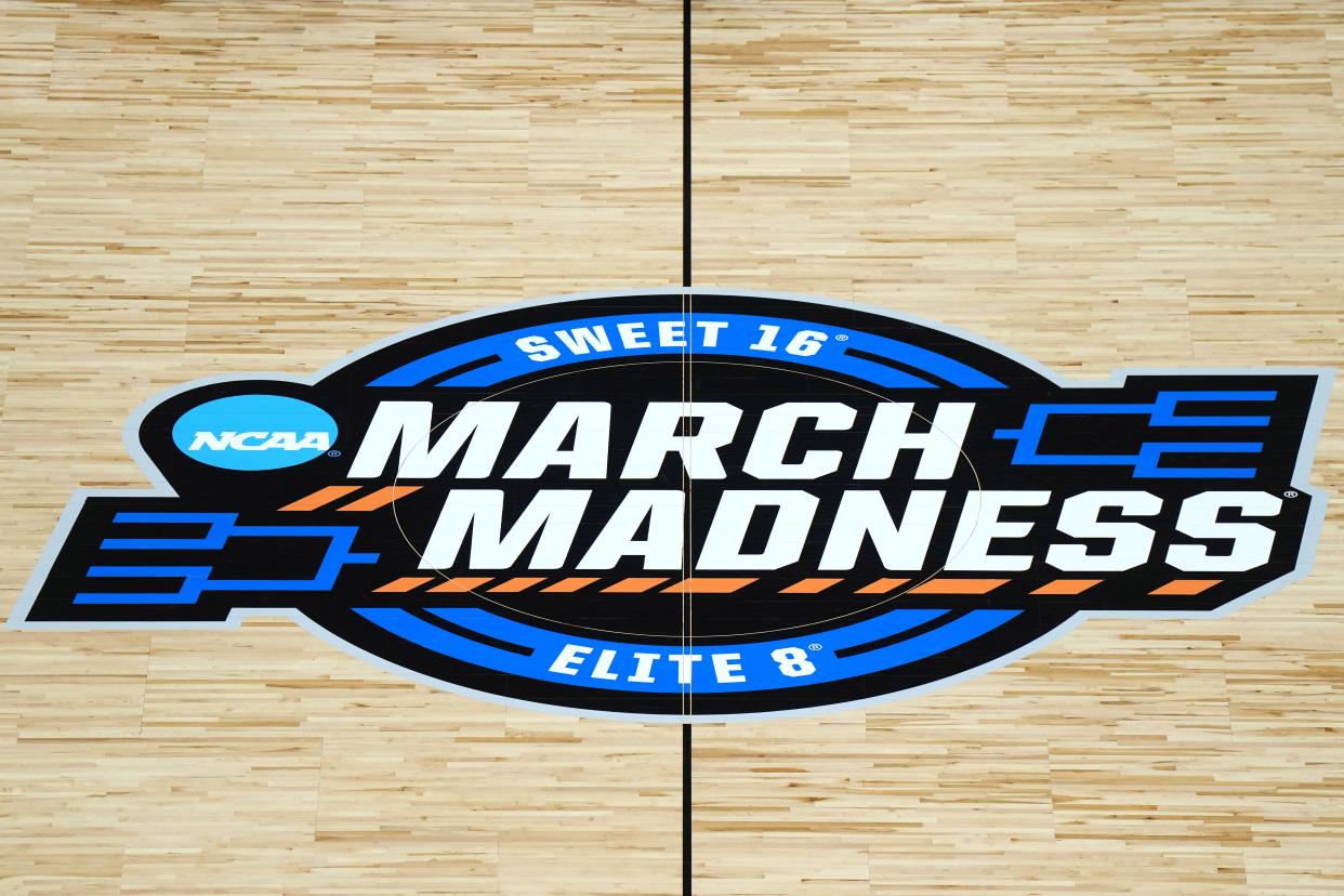 A general overall view of the March Madness Sweet 16 and Elite 8 logo at center court at Climate Pledge Arena.