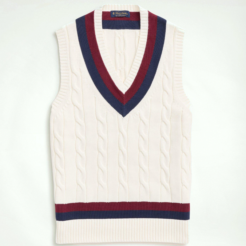 <p><a href="https://go.redirectingat.com?id=74968X1596630&url=https%3A%2F%2Fwww.brooksbrothers.com%2Fvintage-inspired-tennis-v-neck-vest-in-supima%25C2%25AE-cotton%2FMS01129.html%3Fdwvar_MS01129_Color%3DMISC%26dwvar_MS01129_Size%3DLG%26quantity%3D1%26gclid%3DCj0KCQjw_qexBhCoARIsAFgBlevpz5DybkSLgtvziZCaAQcdQgfQyIslXJGT3vAergGb3NJFSM23UlkaAvU8EALw_wcB&sref=https%3A%2F%2Fwww.esquire.com%2Fstyle%2Fmens-fashion%2Fa60603594%2Ftennis-core-fashion%2F" rel="nofollow noopener" target="_blank" data-ylk="slk:Shop Now;elm:context_link;itc:0;sec:content-canvas" class="link rapid-noclick-resp">Shop Now</a></p><p>Vintage-Inspired Tennis V-Neck Vest</p><p>brooksbrothers.com</p><p>$128.00</p>