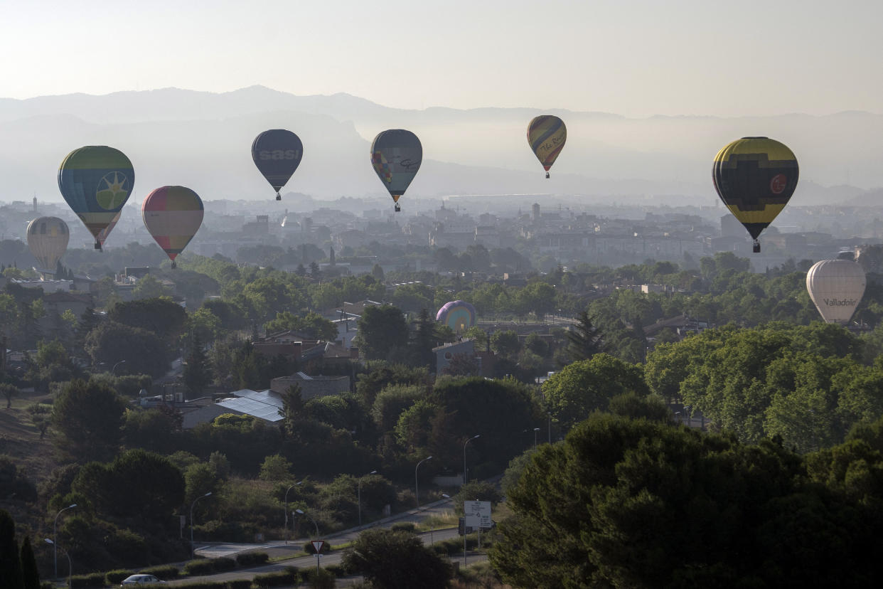 Airborne hot-air balloons. 