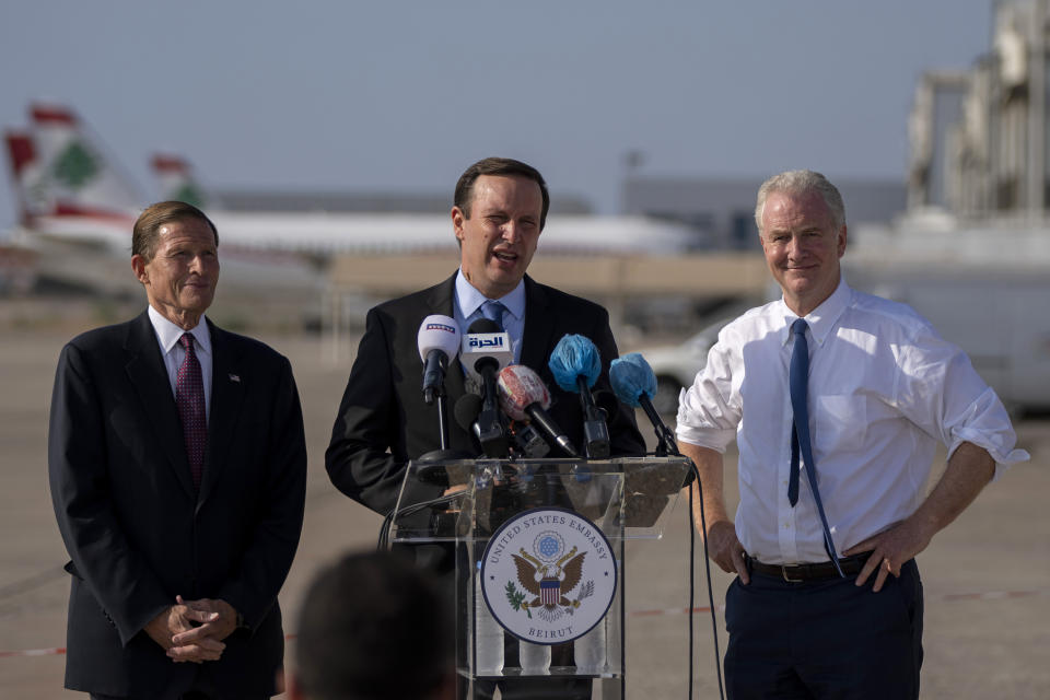 Sen. Chris Murphy, D-C.T., center, Sen. Chris Van Hollen, D-Md., right, and Sen. Richard Blumenthal, D-C.T., attend a press conference at the military airbase in Beirut airport, Lebanon, Wednesday, Sept. 1, 2021. A delegation of four U.S. senators visiting Lebanon promised to work on easing Lebanon's crippling economic crisis. (AP Photo/ Hassan Ammar)