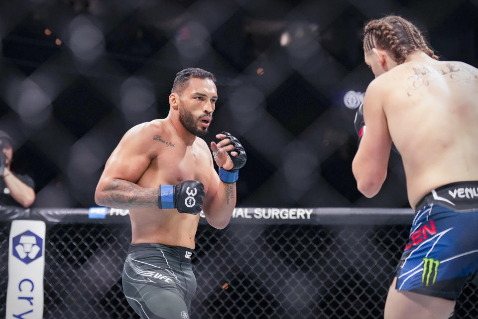 Jun 24, 2023; Jacksonville, Florida, USA; Brendan Allen (red gloves) fights Bruno Silva (blue gloves) in a middleweight bout during UFC Fight Night at VyStar Veterans Memorial Arena. Mandatory Credit: David Yeazell-USA TODAY Sports