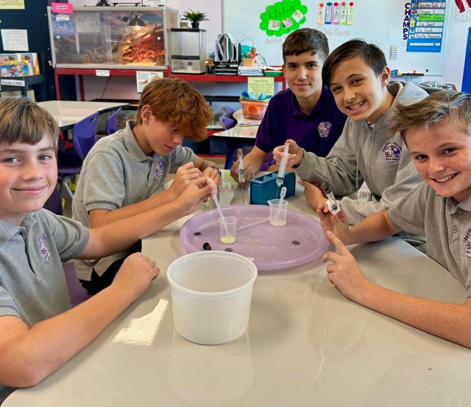 From left, the "Bacteria Boys" -- Evan Ireland, Connor Santore, Eric DiStasi, Liam Hauser and Luke Costa -- of Pinecrest Academy Space Coast designed a science experiment that will launch aboard the NASA-SpaceX CRS-29 resupply mission to the International Space Station.