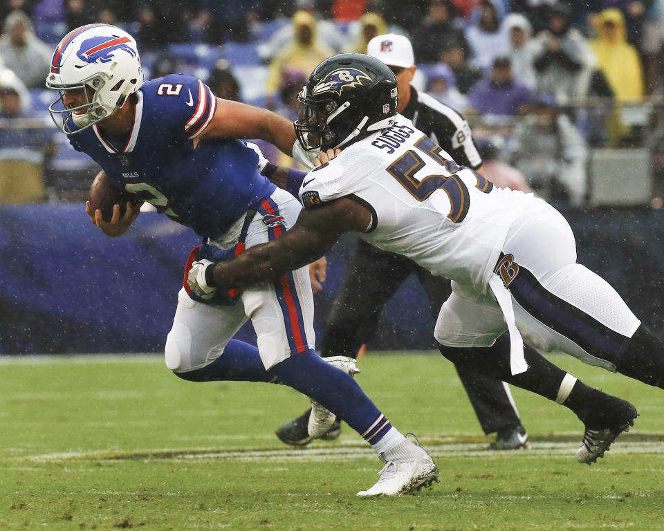 Baltimore Ravens linebacker Terrell Suggs (55) sacks Buffalo Bills quarterback Nathan Peterman (2) during the first half of an NFL football game Sunday, Sept. 9, 2018, in Baltimore. (AP Photo/Patrick Semansky)