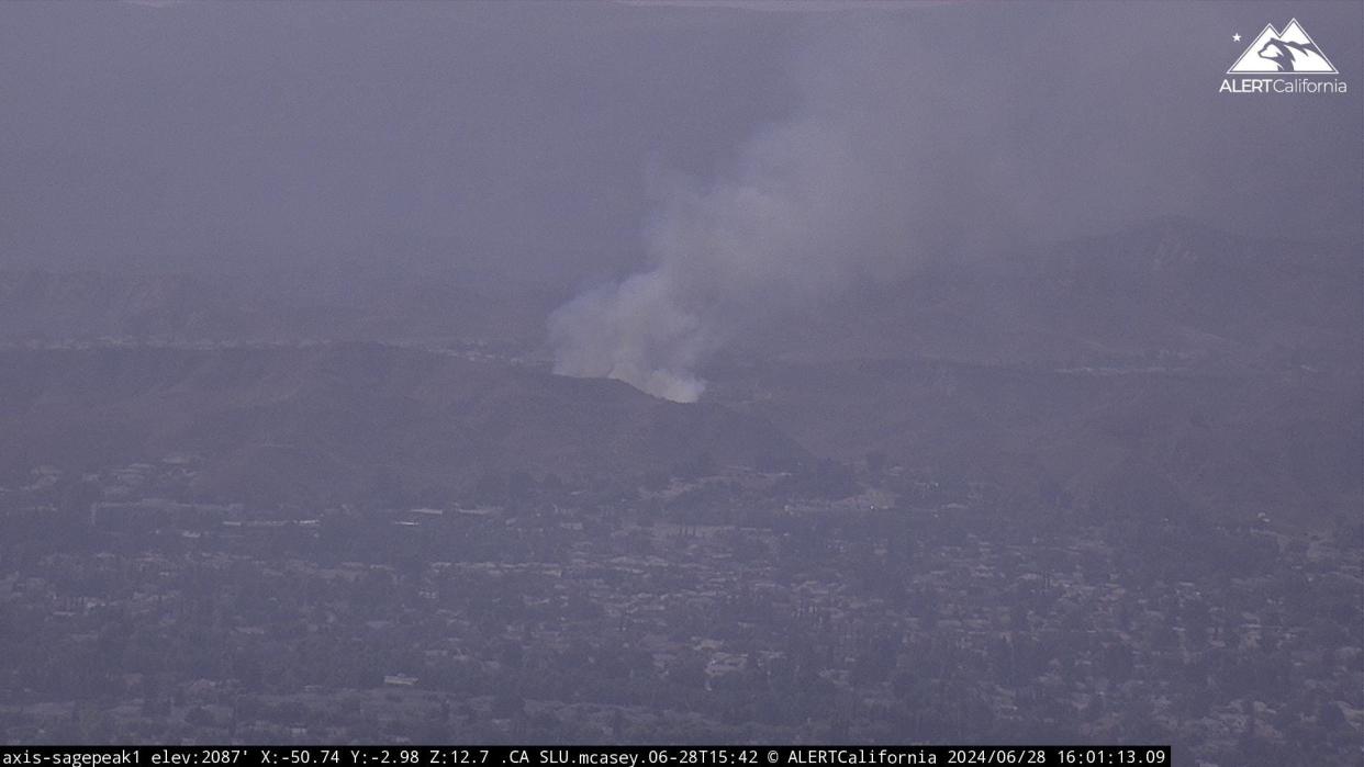 Smoke from a fire in the Simi Valley hills shows in an Alert California camera on Friday afternoon.