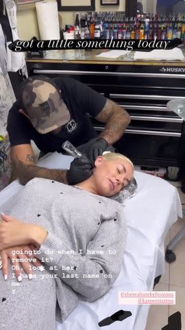 <p>Heather Rae El Moussa/instagram</p> A screenshot of Heather Rae El Moussa laying down as she got her brand new tattoo.