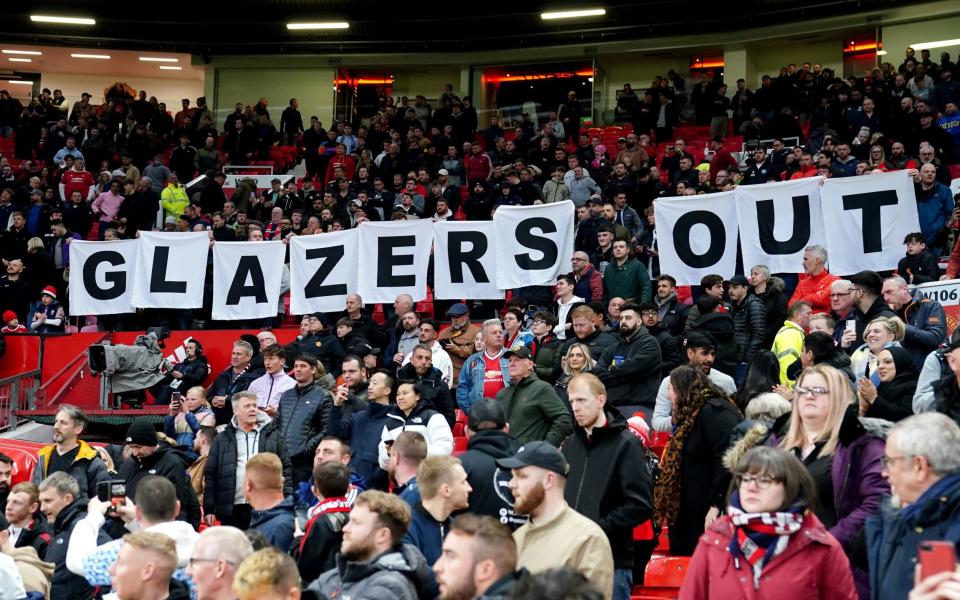 Manchester United fans protesting against the Glazer family. - Martin Rickett/PA Wire