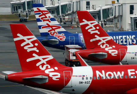 FILE PHOTO: AirAsia planes sit on the tarmac at Kuala Lumpur International Airport, Malaysia August 28, 2016. REUTERS/Edgar Su/File Photo