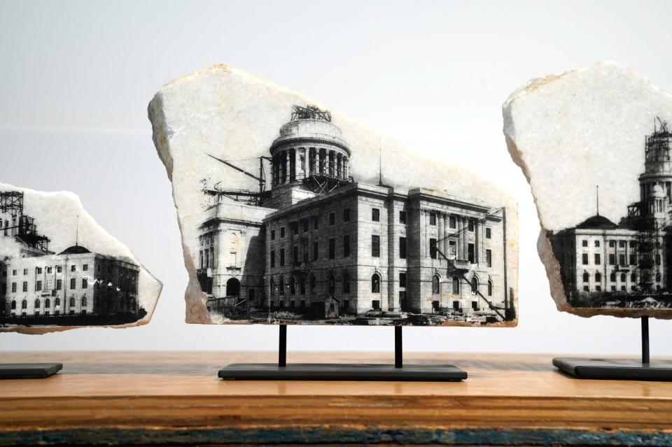 Artist David Allyn silkscreened historical photos, from the 1898-1899 construction of the State House, onto the faces of recovered marble blocks.
