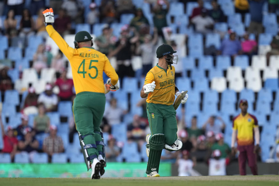 South Africa's batsman Aiden Markram, right, with teammate Heinrich Klaasen, celebrate after scoring the winning run during the second T20 cricket match between South Africa and West Indies, at Centurion Park, in Pretoria, South Africa, Sunday, March 26, 2023. South Africa beat West Indies by 6 wickets with 7 balls remaining. (AP Photo/Themba Hadebe)