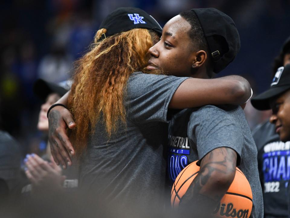 Kentucky's Rhyne Howard (10) and Dre'una Edwards (44) hug during the celebration after defeating South Carolina to win the SEC women's basketball championship game in Nashville, Tenn. on Sunday, March 6, 2022. 