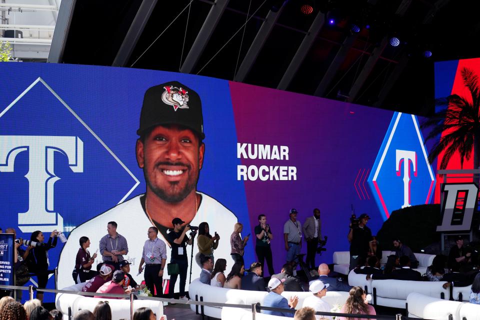 Kumar Rocker is annonunced as the third pick of the 2022 MLB baseball draft, by the Texas Rangers, Sunday, July 17, 2022, in Los Angeles. (AP Photo/Jae C. Hong)