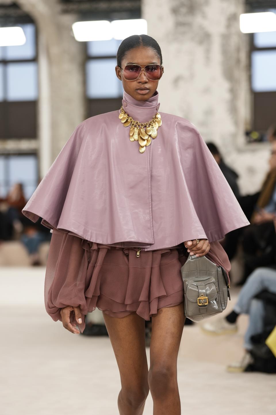 A model wears a creation as part of the Chloe Fall/Winter 2024-2025 ready-to-wear collection presented Thursday, Feb. 29, 2024 in Paris. (Photo by Scott A Garfitt/Invision/AP)