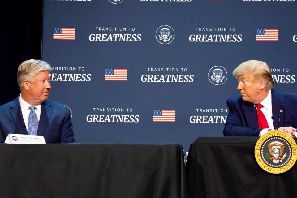 Pastor Robert Morris, left, listens as President Donald Trump speaks during a roundtable discussion about “Transition to Greatness: Restoring, Rebuilding, and Renewing,” at Gateway Church Dallas Campus, Thursday, June 11, 2020, in Dallas.