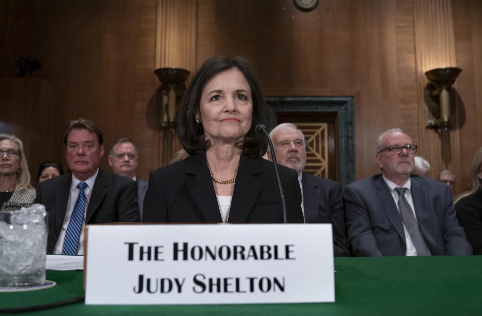 FILE - In this Feb. 13, 2020 file photo, President Donald Trump's nominee to the Federal Reserve, Judy Shelton, appears before the Senate Banking Committee for a confirmation hearing, on Capitol Hill in Washington. President Donald Trump's controversial nominee to the Federal Reserve is facing a razor-close vote in Congress. The Senate is voting Tuesday on the nomination of Judy Shelton to join the Federal Reserve's powerful board of governors. Shelton is an unusually caustic critic of the Fed and is opposed by three Republican senators. Expected absences from two other Republicans could block her from advancing in Tuesday’s vote. (AP Photo/J. Scott Applewhite, File)