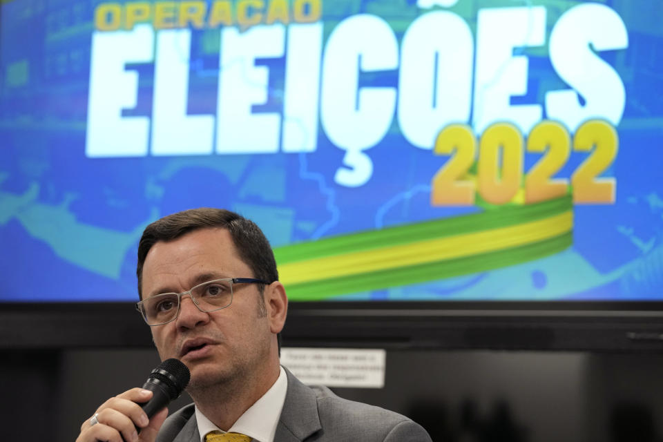 FILE - Brazilian Justice Minister Anderson Torres gives a press conference on the operation coined Operation Elections at the Command and Security Center of the Justice Ministry ahead of general elections in Brasilia, Brazil, Oct. 1, 2022. Brazil's government is prepared to request Torres' extradition should he fail to return from the U.S. by Monday, Jan. 16, 2023, given an outstanding warrant for his arrest in connection with his role in the Jan. 8 capital riot, according to Brazil's current Justice Minister Flavio Dino on Jan. 13, 2023. (AP Photo/Eraldo Peres, File)