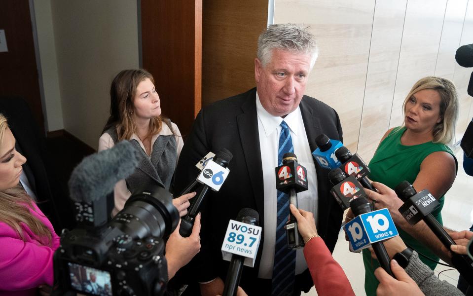 Defense attorney Mark Collins speaks to the media while co-counsel Kaitlyn Stephens stands behind him after a mistrial is declared in the trial of former Franklin County Sheriff's deputy Michael Jason Meade at the Franklin County Common Pleas Court.