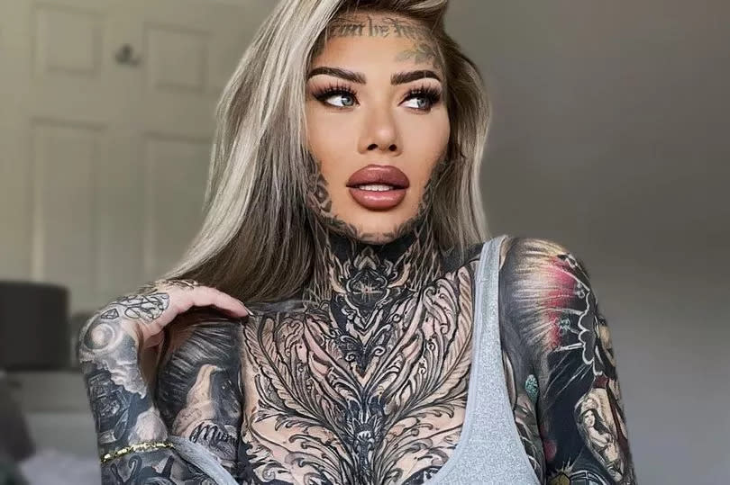Becky Holt has covered 95% of her body in tattoos
