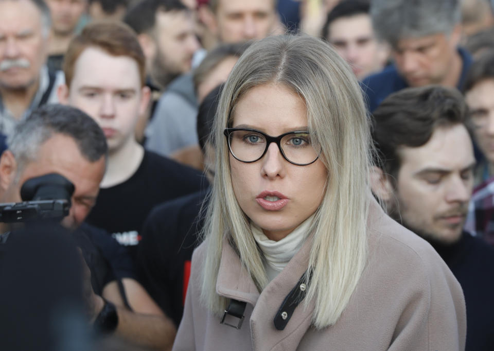 Russian opposition candidate and lawyer at the Foundation for Fighting Corruption Lyubov Sobol speaks to a crowd during a protest in Moscow, Russia, Monday, July 15, 2019. Opposition candidates who run for seats in the city legislature in September's elections have complained that authorities try to bar them from the race by questioning the validity of signatures of city residents they must collect in order to qualify for the race. (AP Photo/Pavel Golovkin)