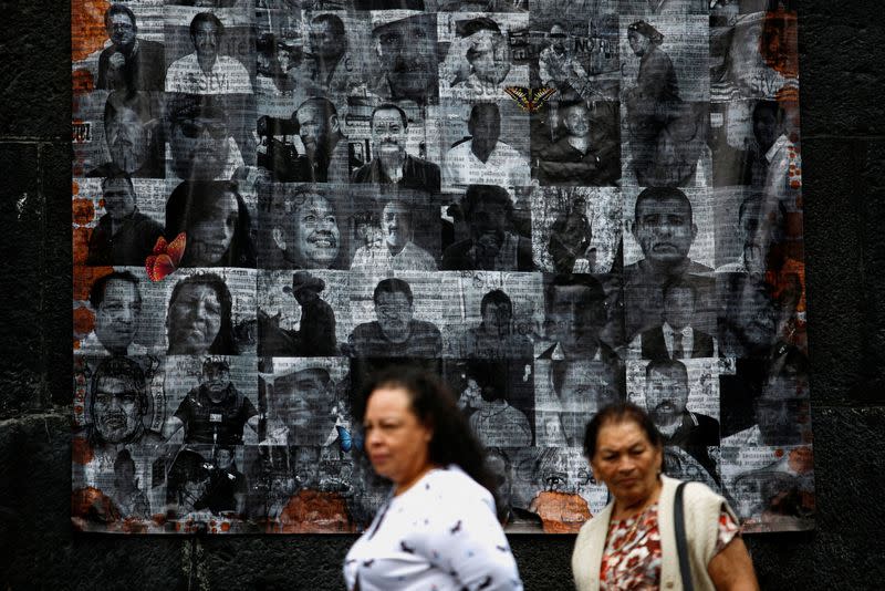 FILE PHOTO: Mexicans pay tribute to the murdered journalists and activists on the eve of the Day of the Dead