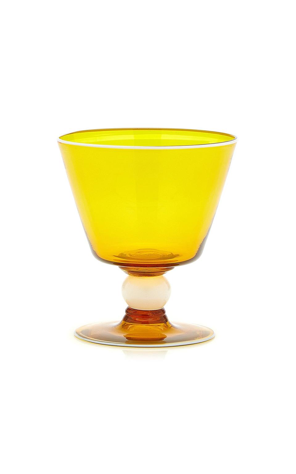 <p>modaoperandi.com</p><p><strong>$210.00</strong></p><p>There's nothing like a standout set of glassware to round out a beautiful tablescape. This festively colored glass will pair swimmingly with an autumnal centerpiece arrangement.</p>