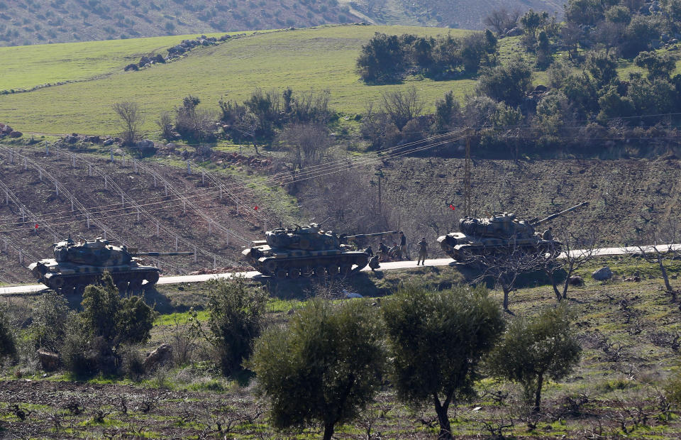 <p>Turkish Army tanks are seen near the Turkish-Syrian border in Kilis province, Turkey, Jan. 31, 2018. (Photo: Osman Orsal/Reuters) </p>