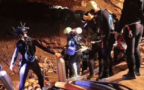 A group of Thai Navy divers in Tham Luang cave during rescue operations - Credit: AFP/Getty 