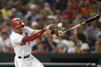 Washington Nationals' Trea Turner fouls off a pitch during the eighth inning of the team's baseball game against the Miami Marlins, Wednesday, July 21, 2021, in Washington. The Marlins won 3-1. (AP Photo/Nick Wass)