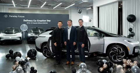 FF Founder and Chief Product and User Ecosystem Officer YT Jia (Left) handed over the vehicle to Mr. He’s representative. (Photo: Business Wire)