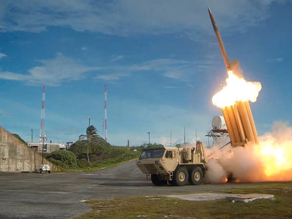 FILE PHOTO - A Terminal High Altitude Area Defense (THAAD) interceptor is launched during a successful intercept test, in this undated handout photo provided by the U.S. Department of Defense, Missile Defense Agency.  U.S. Department of Defense, Missile Defense Agency/Handout via Reuters/File Photo