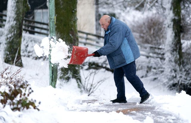 Man clears path of snow