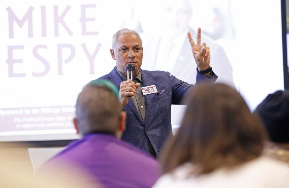 Mike Espy who is seeking to unseat appointed U.S. Sen. Cindy Hyde-Smith, R-Miss., and serve the last two years of the six-year term vacated when Republican Thad Cochran retired for health reasons, speaks about his experience in government as a congressman and agriculture secretary in the Clinton administration, before college students at a town hall meeting at Millsaps College in Jackson, Miss., Thursday, Nov. 15, 2018. (AP Photo/Rogelio V. Solis)