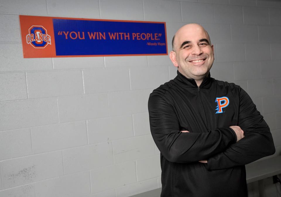 Olentangy Orange's Brian Nicola is The Dispatch's All-Metro Girls Wrestling Coach of the Year.
