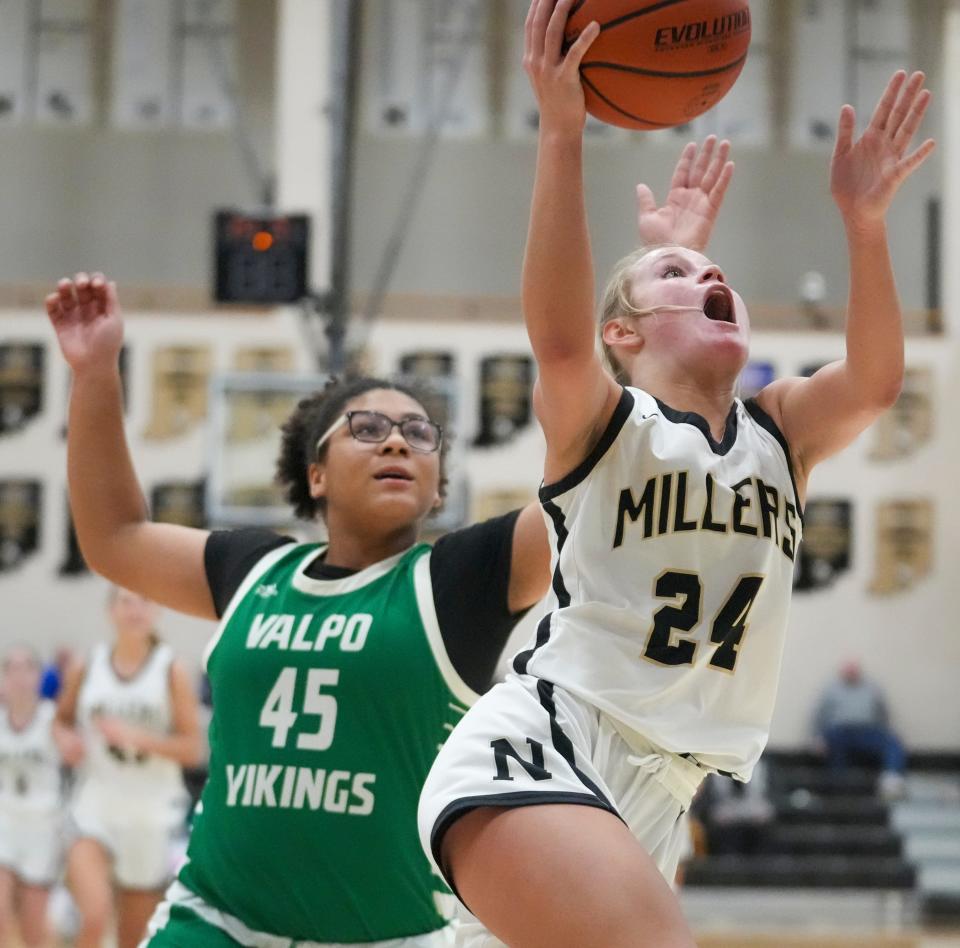 Valparaiso High School's Delilah Kincaid (45) defends Noblesville High School's Kate Rollins (24) at Noblesville High School, Dec 28, 2023. Noblesville won 65-56.