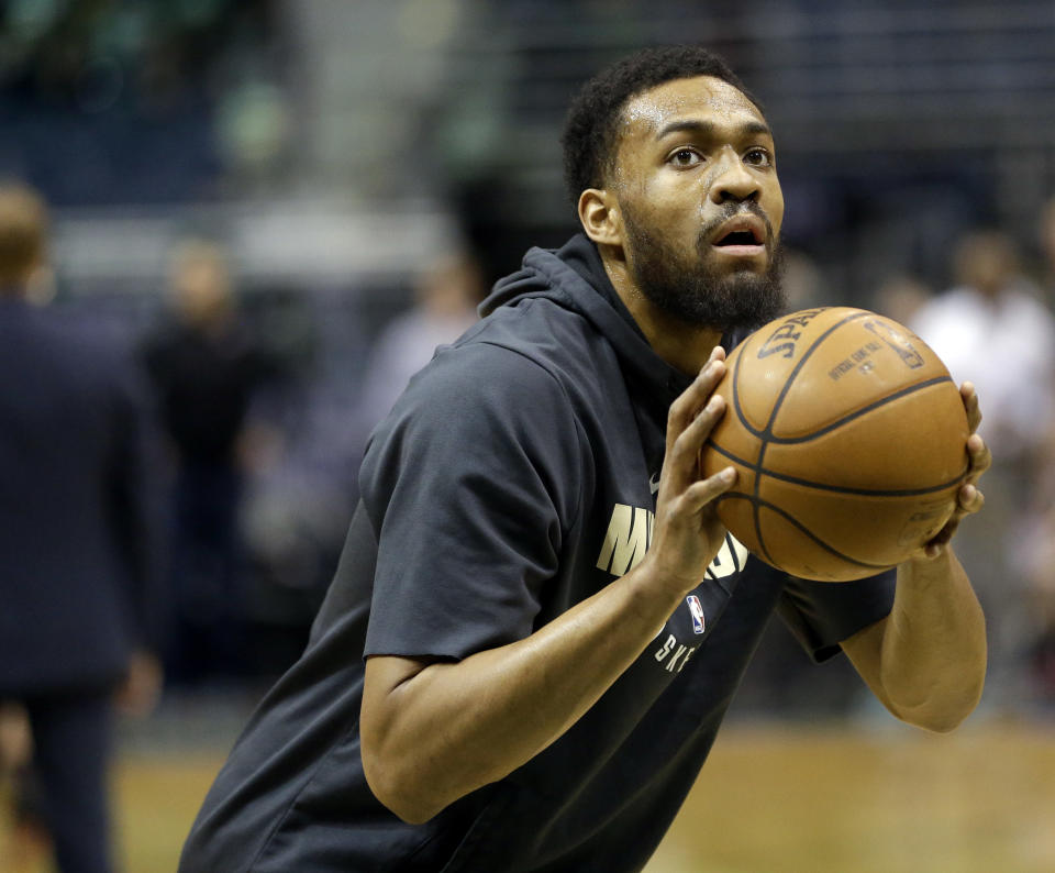 Jabari Parker shoots during warmups against the Miami Heat on Jan. 17. (AP)