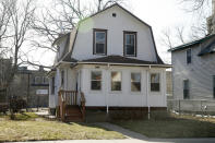 The house in Minneapolis which appeared in musician Prince's film "Purple Rain" is shown on April 1, 2017. Short-term rental giant Airbnb is listing 11 iconic locations, including the Minneapolis house, for a limited time in a splashy new marketing campaign. (AP Photo/Jim Mone, File)