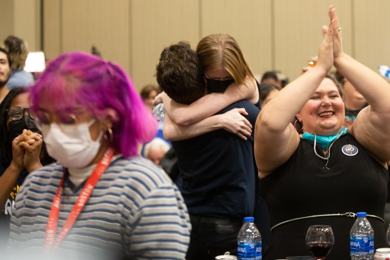 The sound of applause and cheering fills a room at the Overland Park Convention Center as abortion-rights supporters celebrate the state rejecting a proposed abortion amendment to the state constitution Tuesday night.