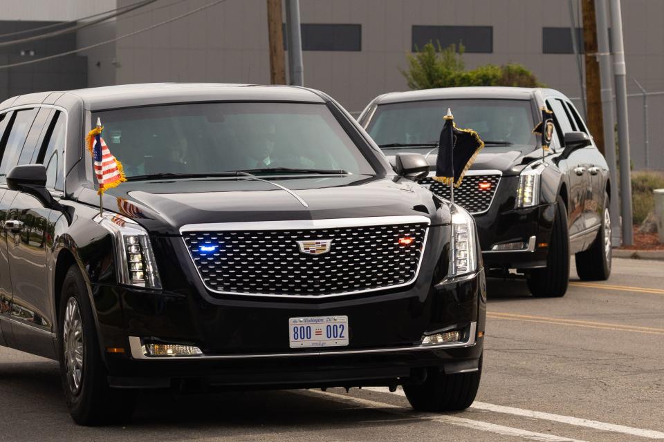 People gather to watch the presidential motorcade drive out of the Roland R. Wright Air National Guard Base in Salt Lake City on Wednesday, Aug. 9, 2023. | Megan Nielsen, Deseret News