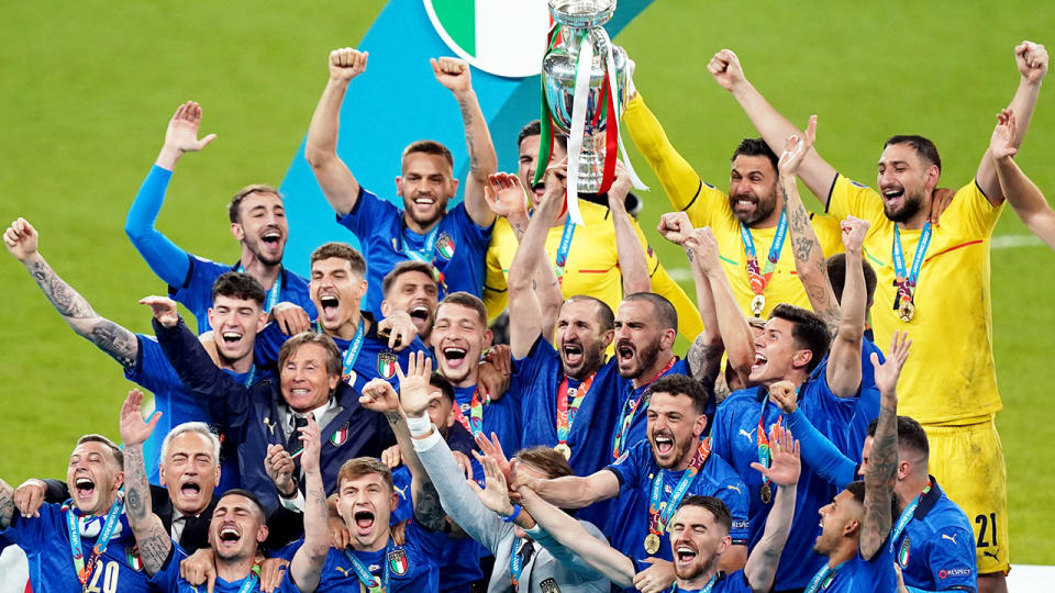 Italy are pictured here celebrating with the Euro 2020 trophy after the final.