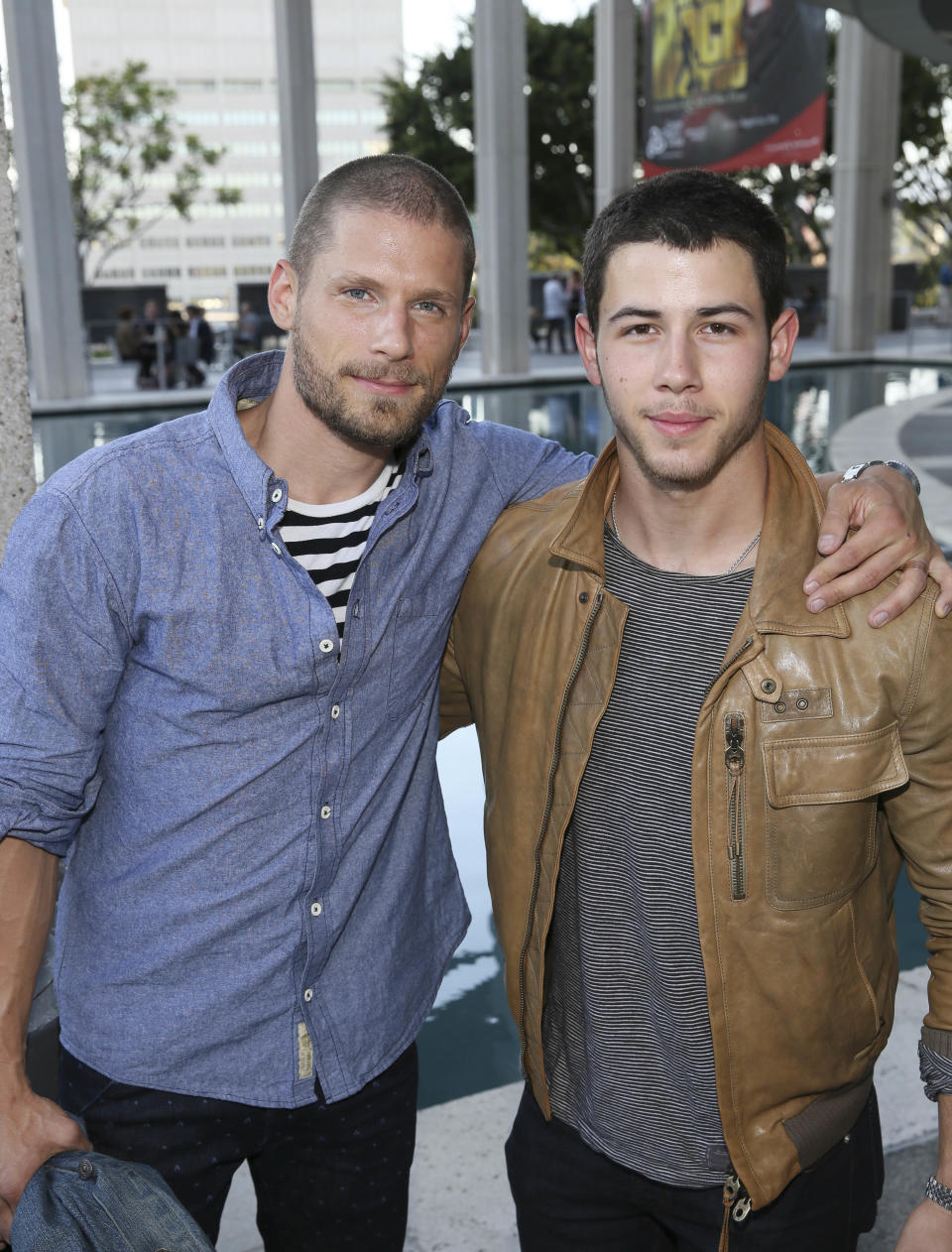 From left, actors Matt Lauria and singer/actor Nick Jonas arrive for the opening night performance of "Buyer &amp; Cellar" at the Center Theatre Group/Mark Taper Forum on July 13, 2014, in Los Angeles, Calif. (Photo by Ryan Miller/Invision/AP)