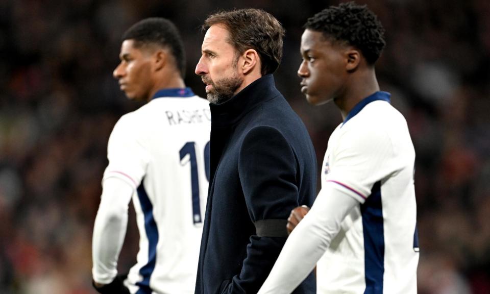 <span>Gareth Southgate praised Kobbie Mainoo after his <a class="link " href="https://sports.yahoo.com/soccer/teams/england/" data-i13n="sec:content-canvas;subsec:anchor_text;elm:context_link" data-ylk="slk:England;sec:content-canvas;subsec:anchor_text;elm:context_link;itc:0">England</a> debut.</span><span>Photograph: Michael Regan/The FA/Getty Images</span>