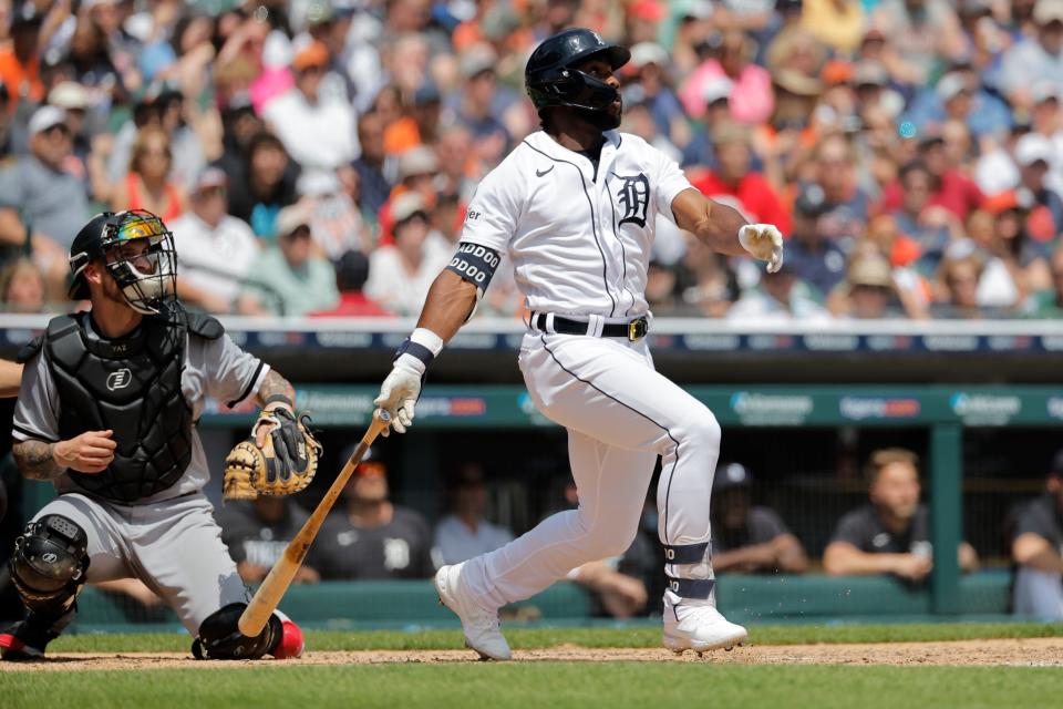 Detroit Tigers left fielder Akil Baddoo (60) hits a grand slam in the third inning against the Chicago White Sox at Comerica Park in Detroit on Sunday, May 28, 2023.