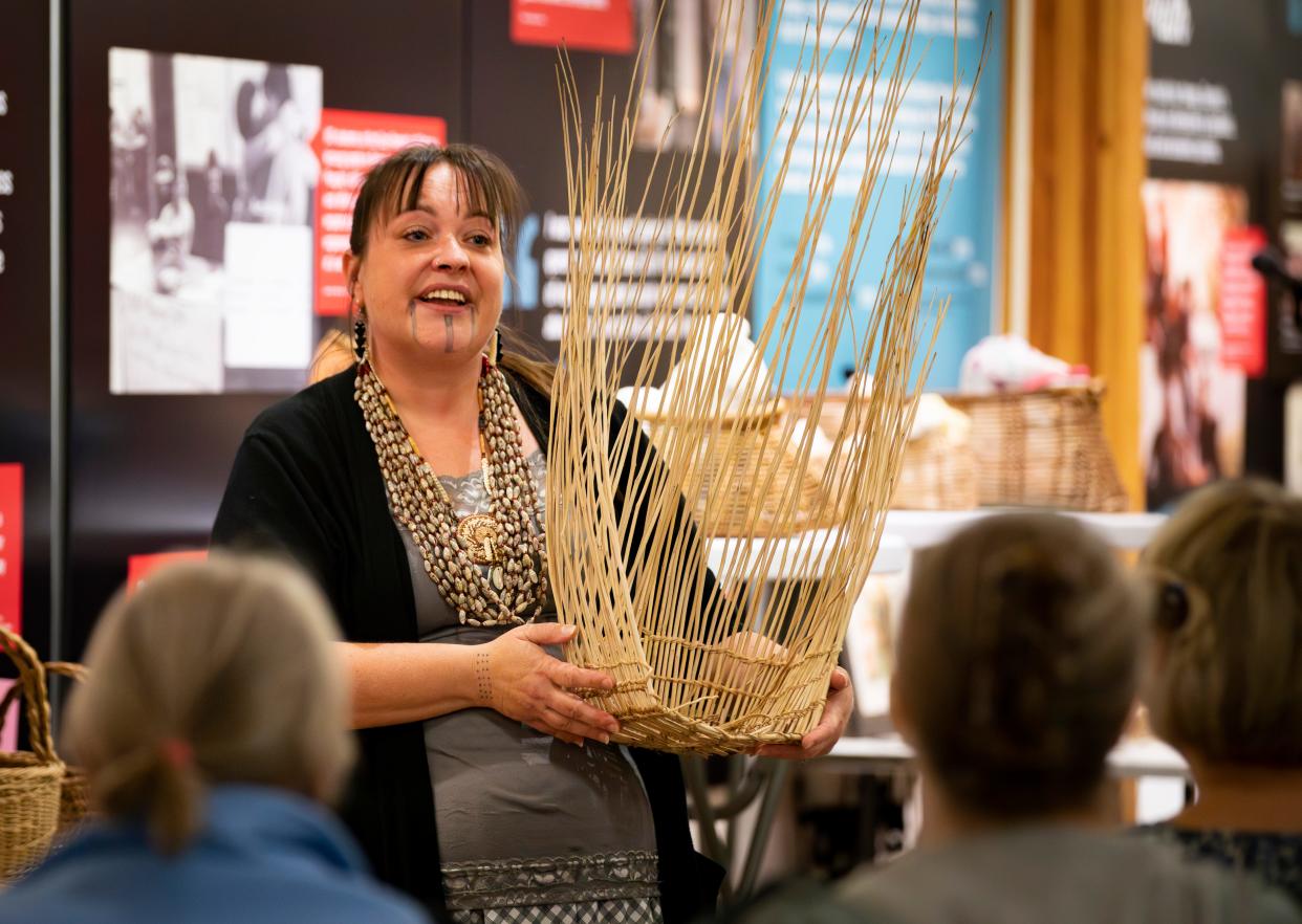Stephanie Craig, a seventh-generation traditional basket weaver discusses basket structure and materials during a presentation at the Museum of Natural and Cultural history in Eugene.