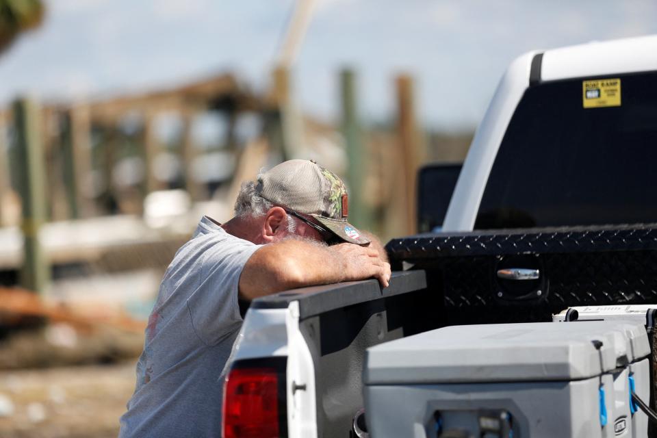 Greg Staab, a resident of Keaton Beach, gets emotional while recovering belongings from his property after Hurricane Helene passed through the Florida panhandle, severely impacting the community in Keaton Beach, Florida (REUTERS)