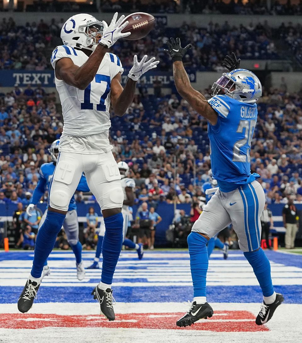 Indianapolis Colts wide receiver Mike Strachan (17) catches the ball for a touchdown against Detroit Lions cornerback Mark Gilbert (29) on Saturday, August 20, 2022 at Lucas Oil Stadium in Indianapolis. The Indianapolis Colts and Detroit Lions are tied at the half, 13-13. 