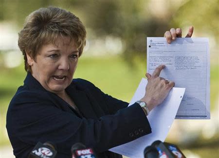 Patricia Carroll, attorney for a Florida State University (FSU) student who said she was sexually assaulted in an incident involving FSU quarterback Jameis Winston, talks to the media about the closed case during a news conference in Zephyr Hills, Florida, December 13, 2013. REUTERS/Steve Nesius